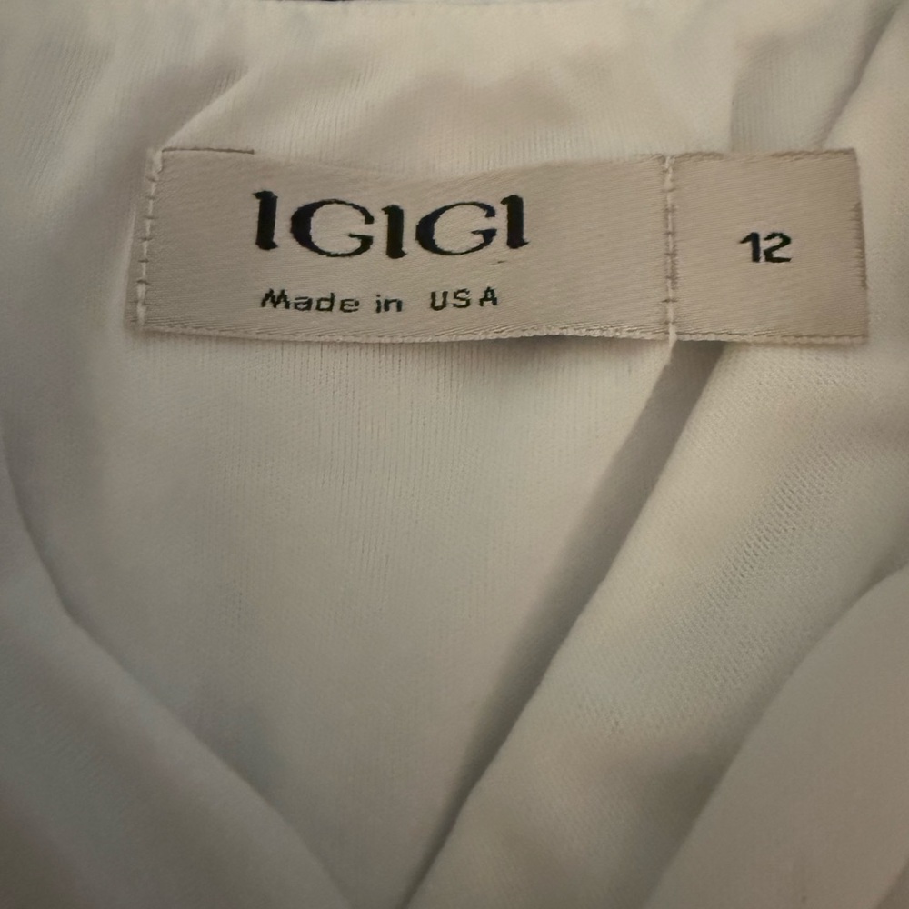 Igigi Wedding Dress with beautiful sparkling belt. 
New! Never worn!